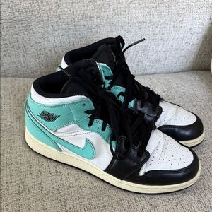 Jordan Women’s Mid-Top Sneakers in Black, White & Teal